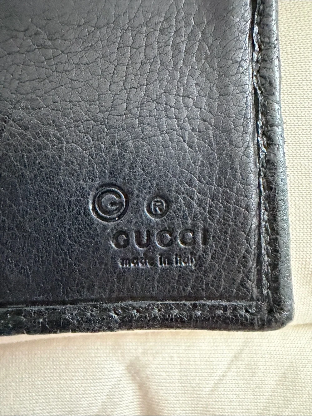 Gucci Guccissima Leather Continental Flap Wallet.
